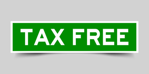 Green color sticker in word tax free on gray background