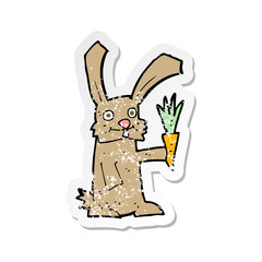 retro distressed sticker of a cartoon rabbit with carrot