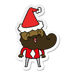 hand drawn sticker cartoon of a happy bearded man wearing santa hat