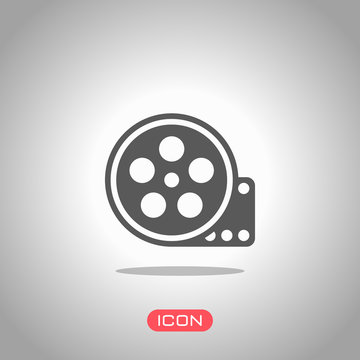 Film roll, old movie strip icon, cinema logo. Icon under spotlight. Gray background