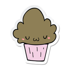 sticker of a cartoon cupcake with face