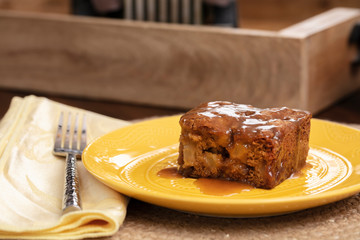 Fototapeta na wymiar Baked Apple Pecan Cake on a table setting