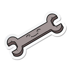 sticker of a cartoon spanner