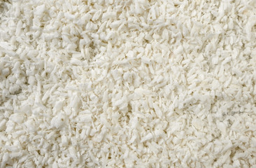 coconut shreds background. Natural seasoning texture. Natural spices and food ingredients.