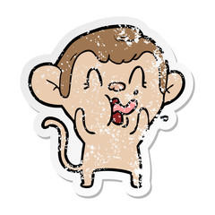 distressed sticker of a crazy cartoon monkey