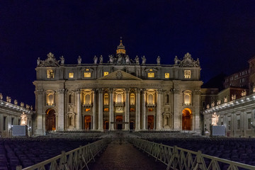 Fototapeta na wymiar Vatican City,Italy - 23 June 2018: St.Peters Basilica is illuminated with lights at night in Vatican city in the square at night