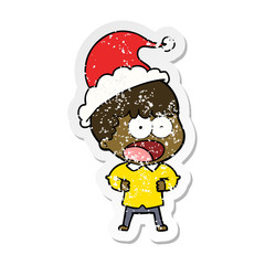 distressed sticker cartoon of a shocked man wearing santa hat