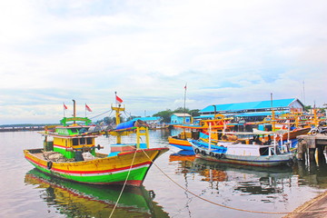 Fototapeta na wymiar FISHING BOATS IN MAYANGAN PORT, PROBOLINGGO, EAST JAVA, INDONESIA