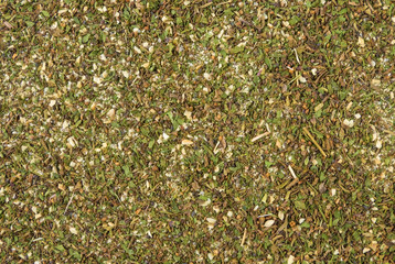 green savory mix or Chubritsa background. Natural seasoning texture. Natural spices and food ingredients.