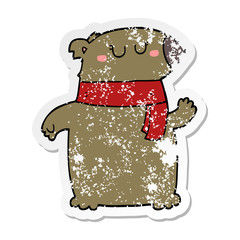 distressed sticker of a cartoon bear with scarf