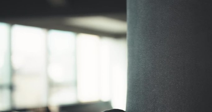 Fighter Practicing Some Kicks With Punching Bag