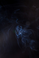 Smoke on a black background.