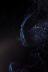 Smoke on a black background.