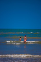 father and son on the beach