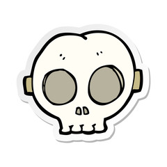sticker of a cartoon halloween skull mask