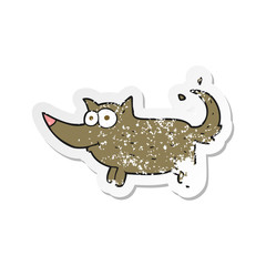 retro distressed sticker of a cartoon dog wagging tail