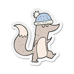 sticker of a cartoon little wolf wearing hat