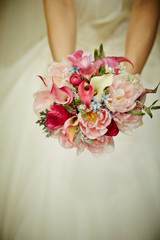 bride holding wedding bouquet