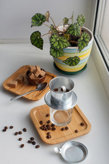 Alternative coffee brewing, fasian filter for making espresso with sugar milk, morning relaxation background