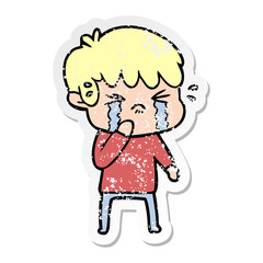 distressed sticker of a cartoon boy crying