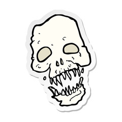 sticker of a cartoon scary skull