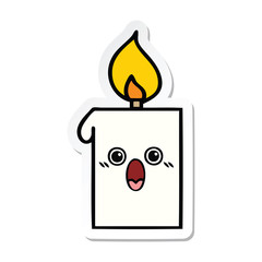 sticker of a cute cartoon lit candle