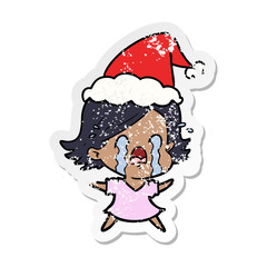 distressed sticker cartoon of a woman crying wearing santa hat