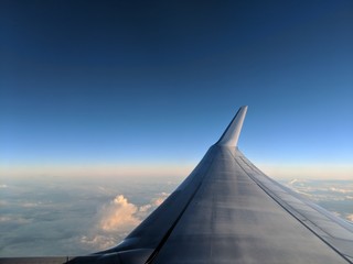 Fototapeta na wymiar Flying above the cloud