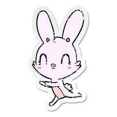 Obraz premium distressed sticker of a cute cartoon rabbit
