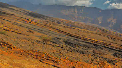Fototapeta premium Fantastic mountain landscape. Ru'us al Jibal. al Hajar Mountains. Musandam. Oman