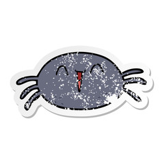 distressed sticker of a cartoon spider