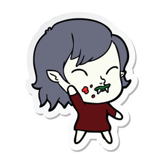 sticker of a cartoon vampire girl with blood on cheek