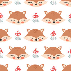 Cute cartoon fox face seamless pattern.
