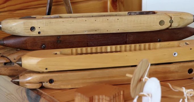 Close-up of wooden loom shuttle in a empty workshop 4k