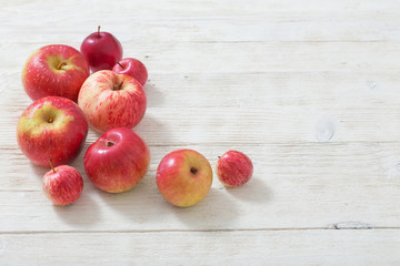 apples on wooden white background