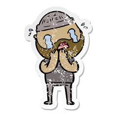 distressed sticker of a cartoon bearded man crying