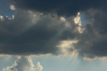 sunlight through cloud on dramatic sky after the rain