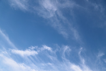 Scenery of bright cloudy blue sky in sunny day.