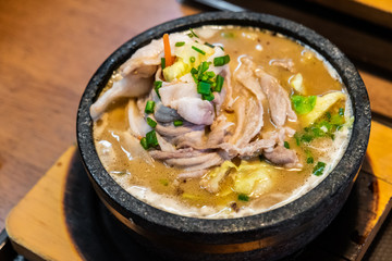 Japanese ramen with broth, noodles, meat, and vegetables. A tasty, warming, and popular meal.