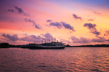 old fishing boat at sunset