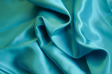 Fabric blue waves - material for background and texture.