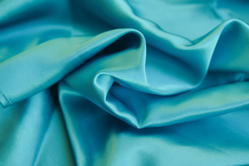 Fabric blue waves - material for background and texture.