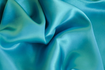 Fabric blue waves - material for background and texture.