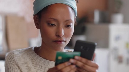 beautiful woman using smartphone shopping online spending money on credit card mobile banking app with digital currency enjoying financial freedom