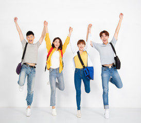 young group of student, smiling and dancing