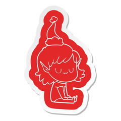 happy cartoon  sticker of a elf girl wearing santa hat