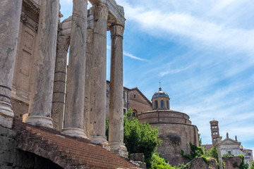 Fototapeta na wymiar The ancient ruins of Temple of Antoninus and Faustina at Palatine Hills, Roman Forum in Rome