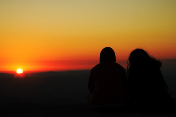 Couple silhouette at sunrise in Brazil
