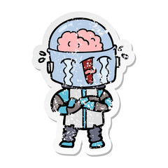 Obraz premium distressed sticker of a cartoon crying robot