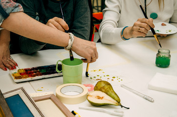 watercolor painting lessons, pear still life with brushes and paints